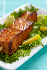 Delicious roasted salmon on skewers