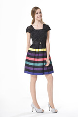 Fashion girl in fashion dress posing in the studio