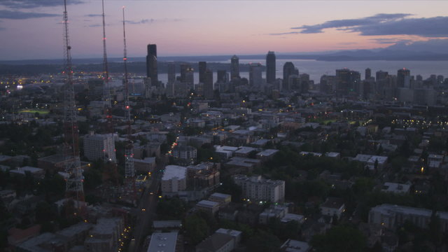 Aerial sunset view Seattle, Queen Anne Hill and 3 television masts, USA