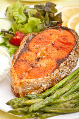 salmon with vegetables, lemon and sauce