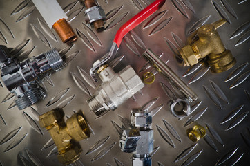 Plumbing Kit on a metal surface