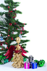 Decorated christmas tree on white background with gifts.