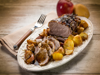 roast  with potatoes and apple, selective focus