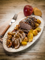 roast  with potatoes and apple, selective focus