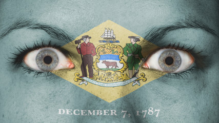 Naklejka premium Close up of eyes with flag