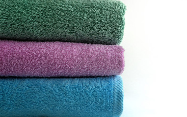 three different color towel