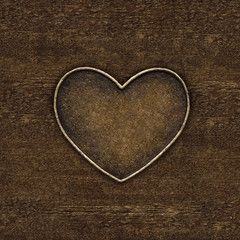 Metal heart on a background of black leather