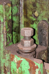 Old metal construction bonded bolts and nut