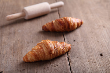 croissant on wood background