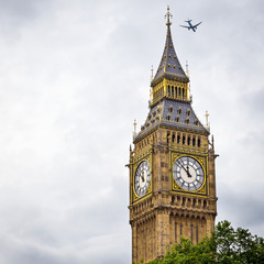 Fototapeta na wymiar Big Ben with airplane