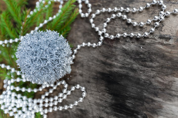 Silver Christmas ball on wooden background