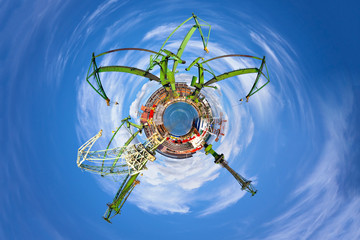 Industry concept with planet on blue sky.