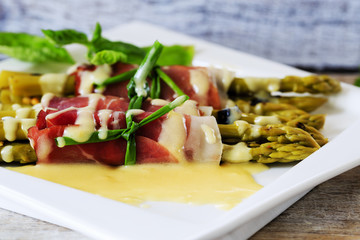 Gourmet meal - Grilled  asparagus with prosciutto