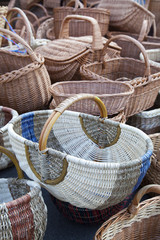 Handmade traditional straw wicker baskets on market