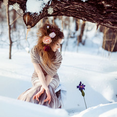 beautiful girl in the winter forest