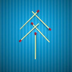 Retro Christmas Tree Made From Matches on Blue Cardboard