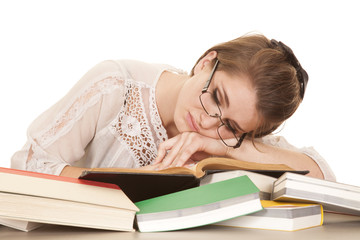 woman lay on books sleeping