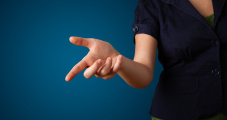 Woman pressing imaginary button