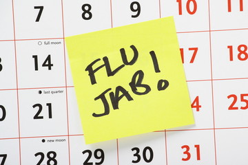 Flu Jab Reminder on a wall calendar