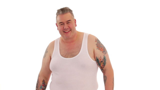 Freaky tattoed man posing.