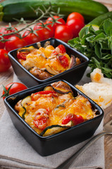 Two dishes of vegetable casserole