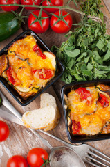 Two dishes of vegetable casserole