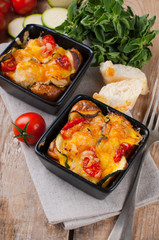 Two dishes of vegetable casserole