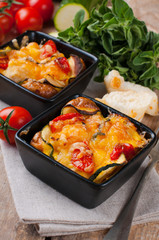Two dishes of vegetable casserole