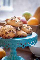 chocolat coockies on old plate before a window