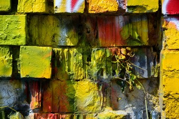 Old brick wall colorful graffiti