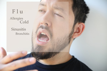 man sneezing with nasal infection words