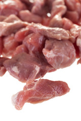 pieces of fresh pork meat isolated on white background