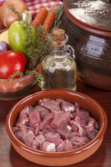 pieces of fresh pork meat ready for cooking in the crock pot