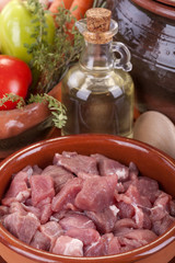 pieces of fresh pork meat ready for cooking in the crock pot