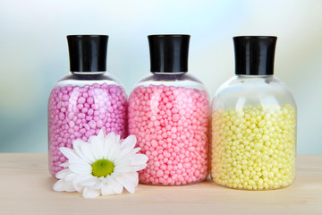 Obraz na płótnie Canvas Aromatherapy minerals - colorful bath salt on light background