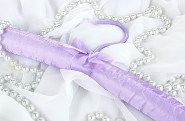 Beautiful hanger on fabric background