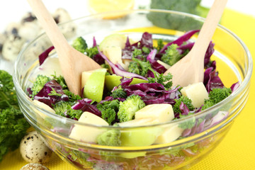 Fresh vegetable salad in bowl isolated on white