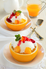 Ice cream in orange peel.