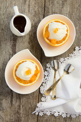 Ice cream in orange peel.
