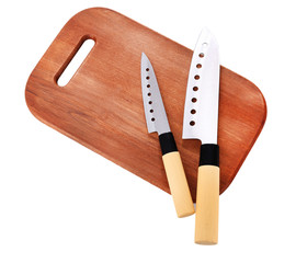 Kitchen knives  and wooden cutting board ,isolated on white