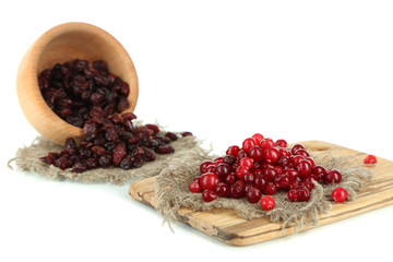 Fresh and dry cranberry, isolated on white