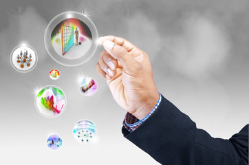 Business man pressing an icon in air