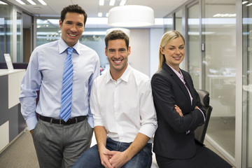Portrait of joyful business team office background