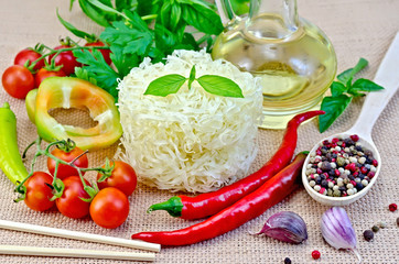 Noodles rice twisted with oil and vegetables