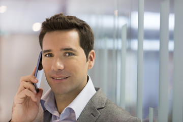 Successful businessman talking on cell phone