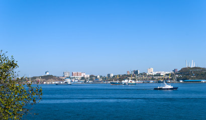 Fototapeta na wymiar Seaport bright sunny day, Vladivostok, Russia