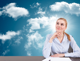 businesswoman with head in the cloud - 58811610