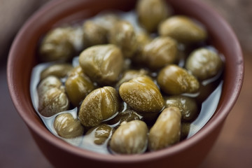 Close-up of marinated capers, horizontal shot