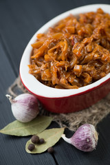 Braised cabbage and cooking ingredients, vertical shot