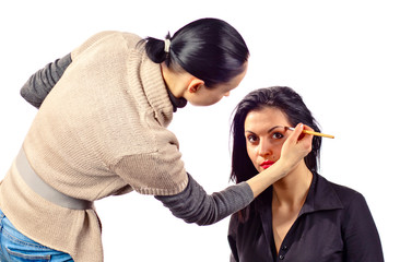 stylist works with model